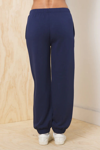 Cloud fleece jogger in Collegiate Navy back view