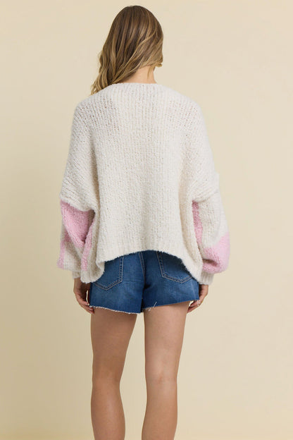 Back of pink checkered cardigan