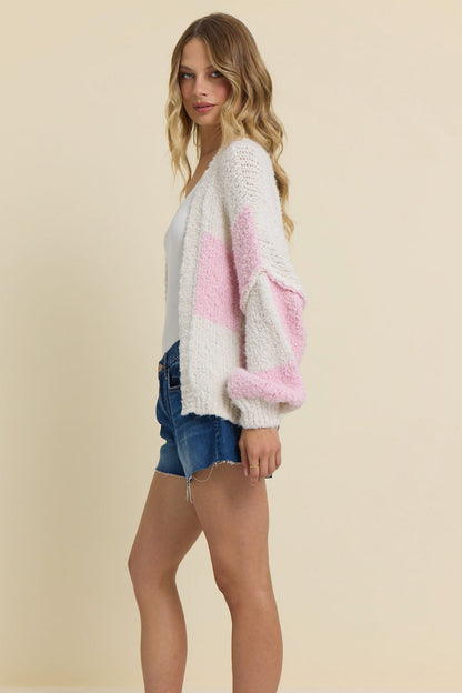 Side of pink checkered cardigan