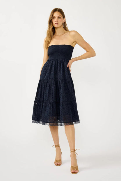 SMOCKED BUST TIERED EYELET DRESS IN NAVY FRONT VIEW