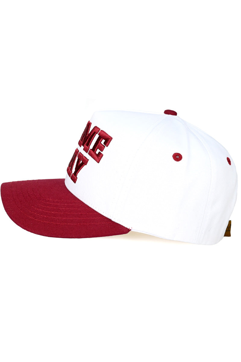 Embroidered game day trucker hat in burgundy and white side view