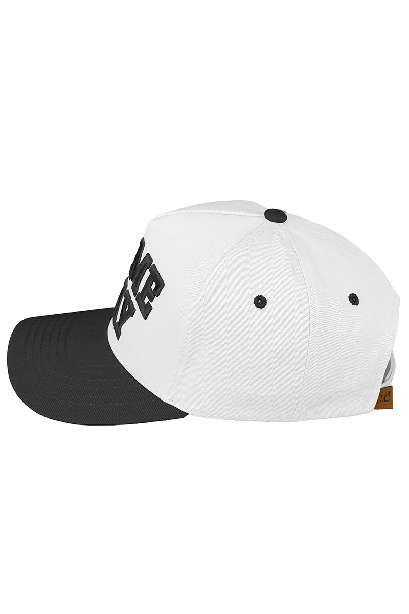 Embroidered game day trucker hat in black and white side view