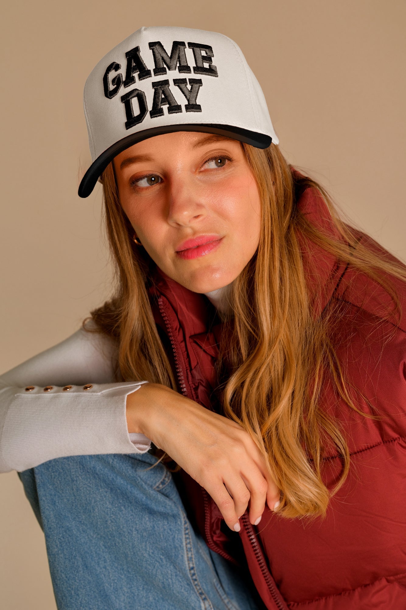 Embroidered game day trucker hat in black and white style view