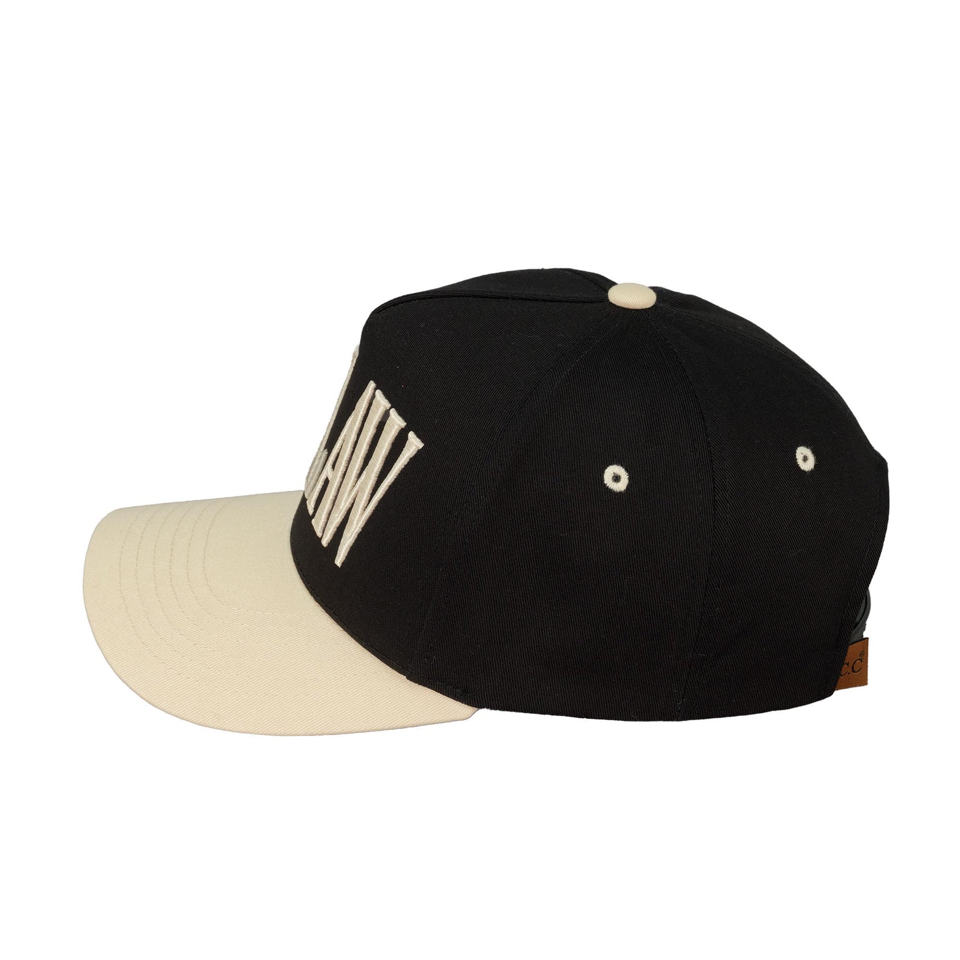 Outlaw trucker hat in black and cream side view