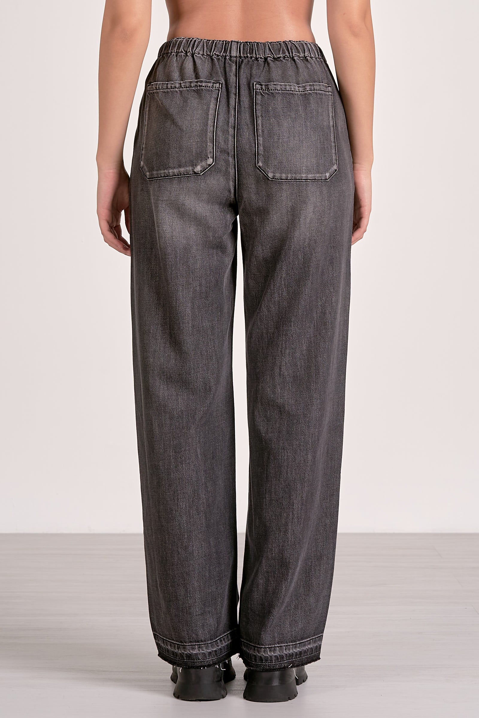DRAWSTRING PANT IN BLACK WASH BACK VIEW