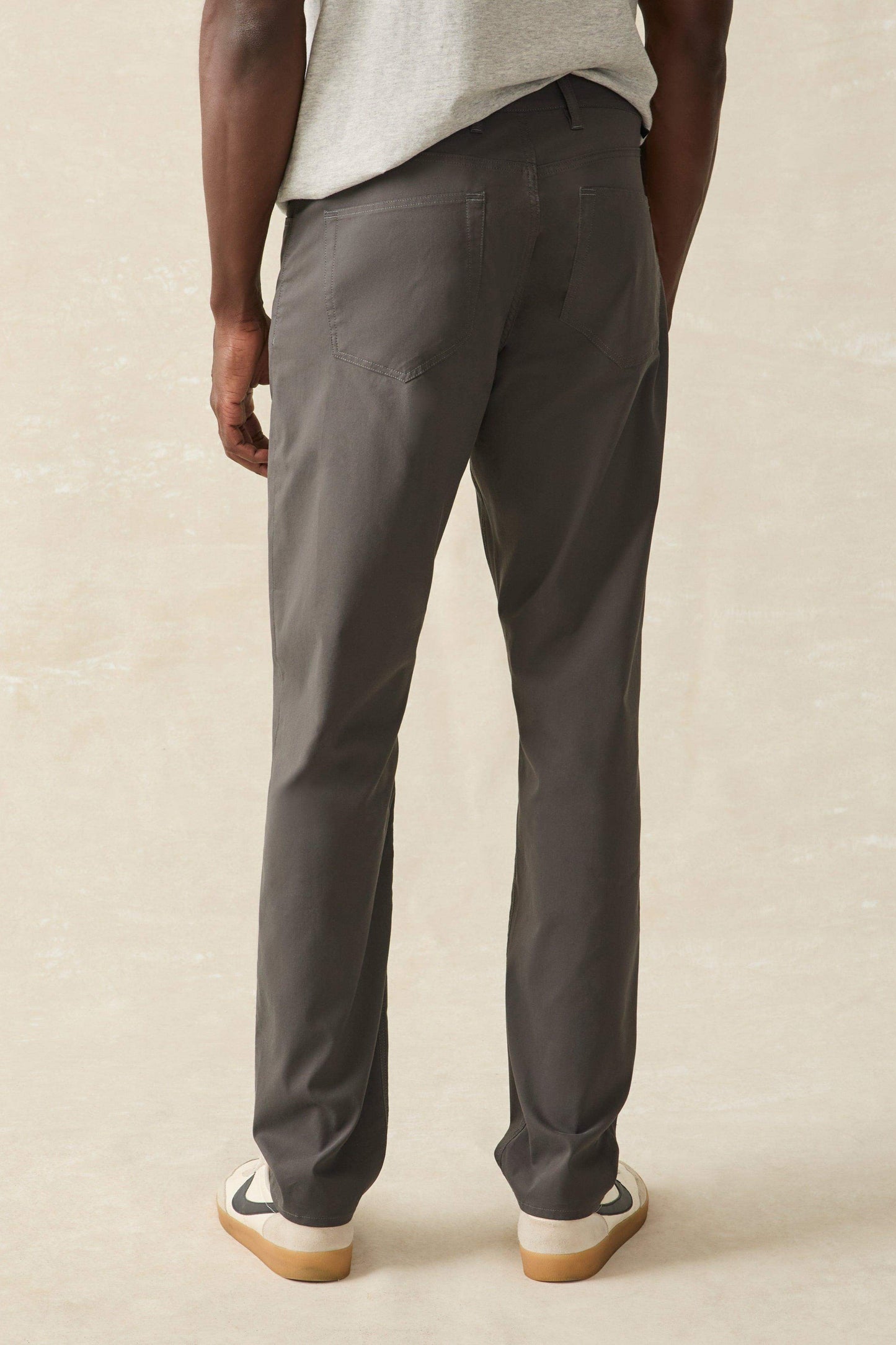 MOVEMENT 5 POCKET PANT IN GRAPHITE BACK VIEW
