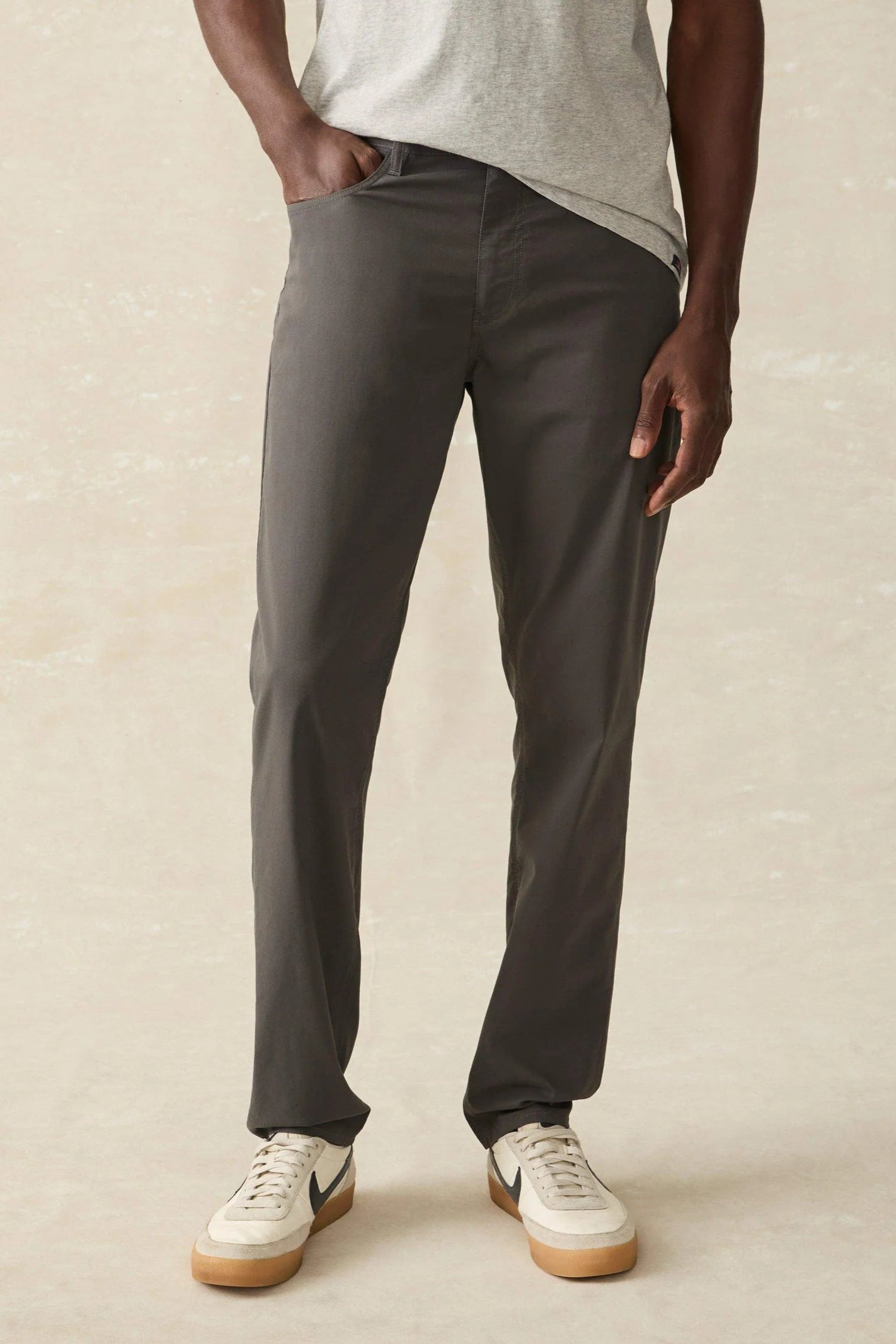 MOVEMENT 5 POCKET PANT IN GRAPHITE FRONT VIEW