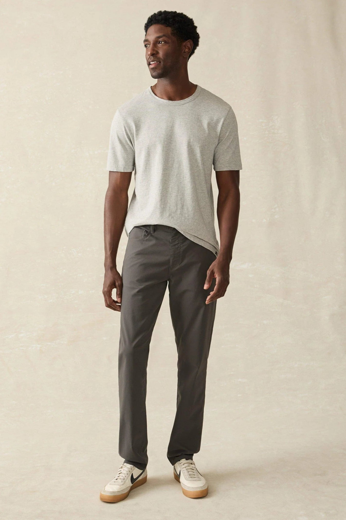 MOVEMENT 5 POCKET PANT IN GRAPHITE FRONT VIEW