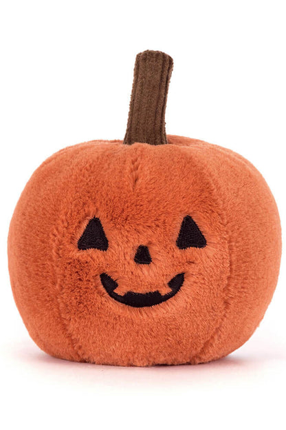A small plush pumpkin toy with a textured orange body, embroidered black jack-o'-lantern face, and a brown stem, photographed on a clean white background.