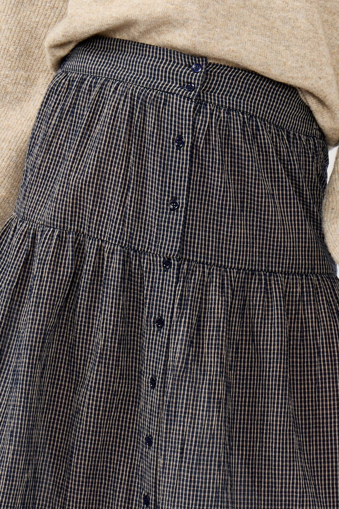 BUTTON DOWN CHECKERED SKIRT SMOCK WAIST FRONT CLOSEUP VIEW