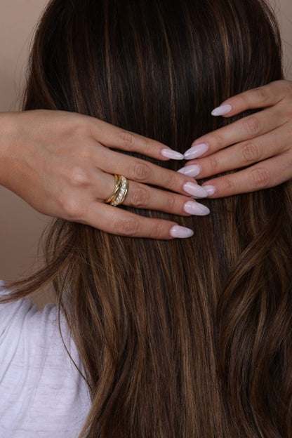 OH SHE FANCY STACKED RING: gold stacked bands on finger