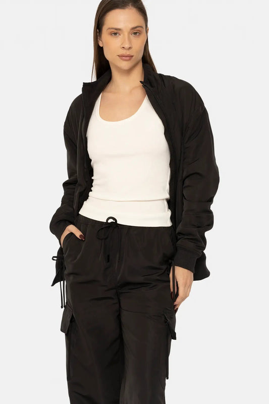 Water resistant satin oversized jacket in black front view