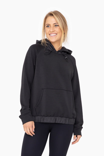 Modal blend pullover hoodie in black front view