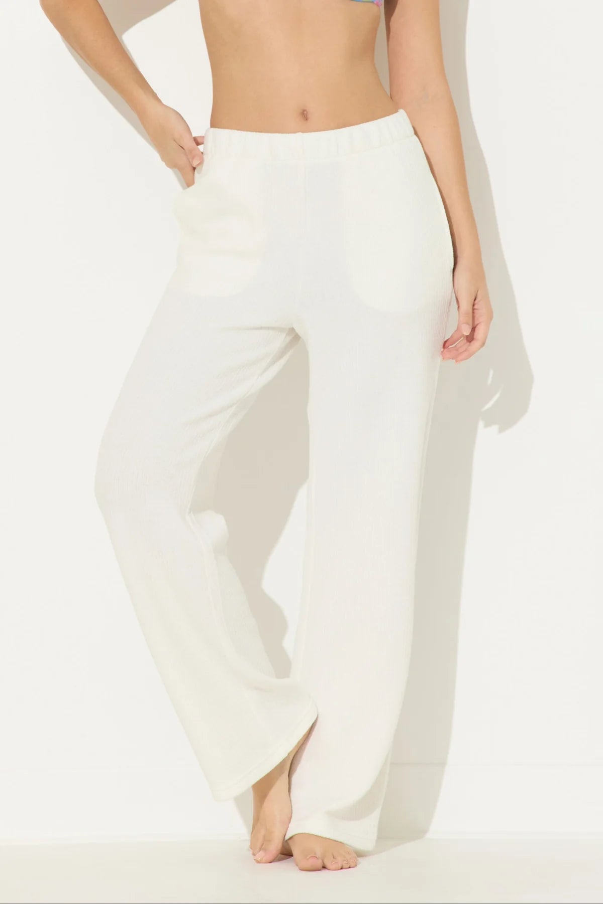 OCEAN TEXTURE RIB CORD PANTS IN WHITE FRONT VIEW