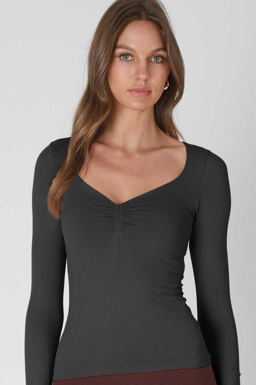 CLEAN LINE FRONT SHIRRED LONG SLEEVE TOP IN BLACK FRONT VIEW