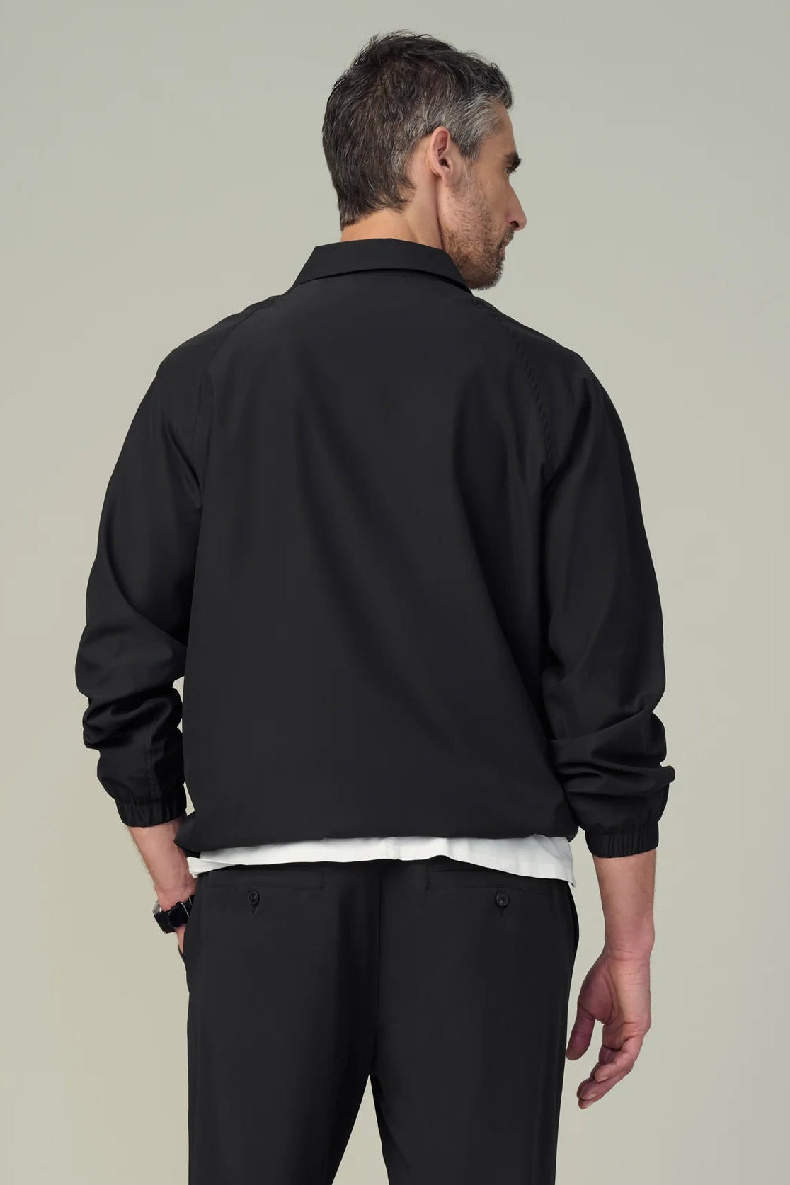 NYLON COACHES JACKET IN BLACK BACK VIEW