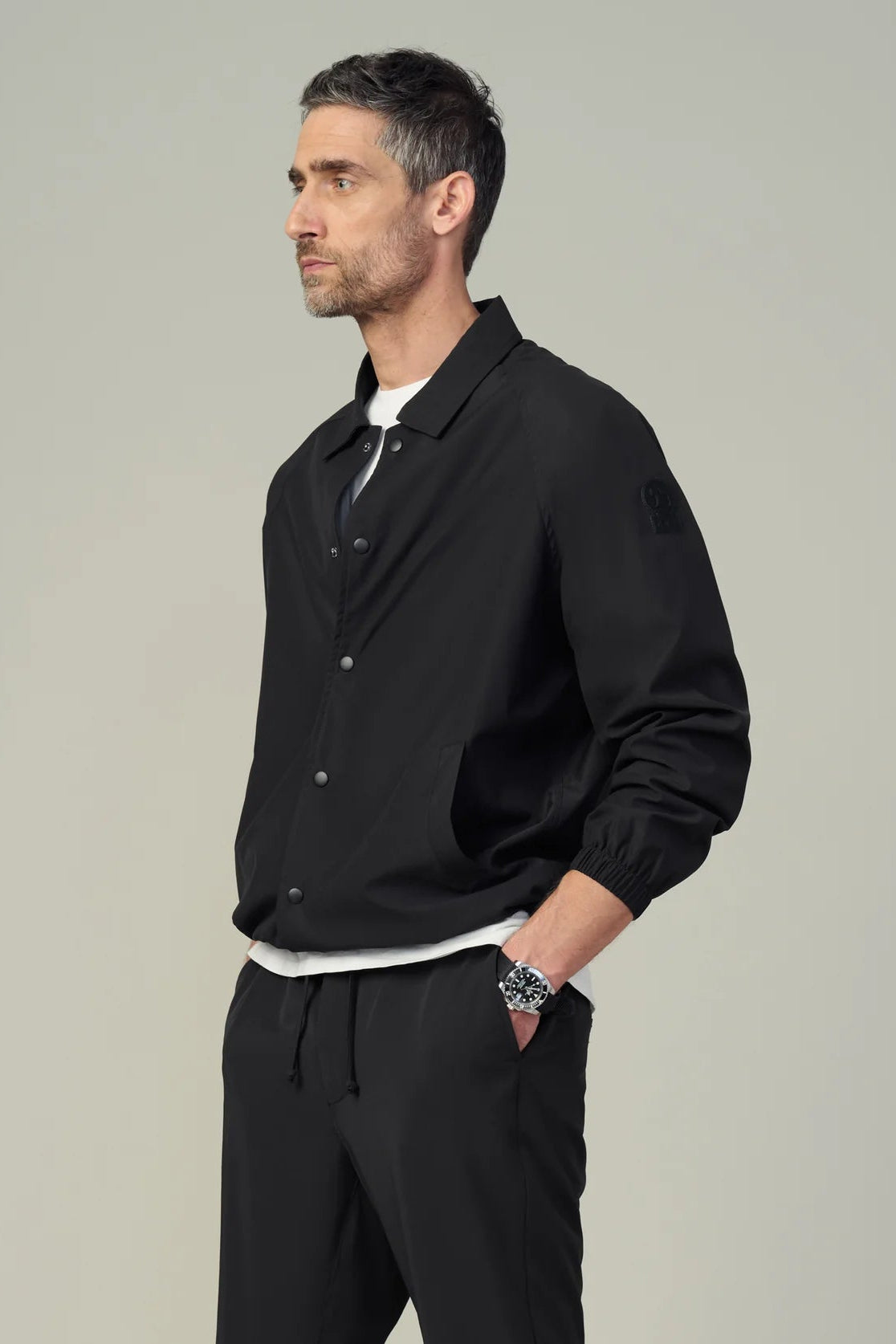 NYLON COACHES JACKET IN BLACK SIDE VIEW