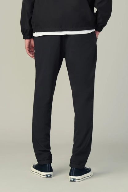 THE LAIRD NYLON PANT IN BLACK BACK VIEW