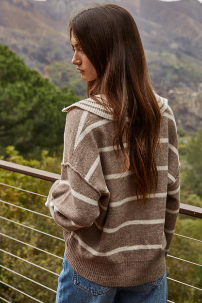 Striped pullover sweater in tan with off-white V-neck and ribbed cuffs, long sleeves