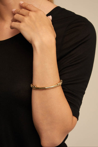 TRABEL BRACELET IN GOLD FRONT VIEW WORN