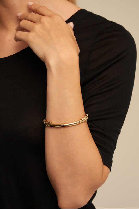 TRABEL BRACELET IN GOLD FRONT VIEW WORN