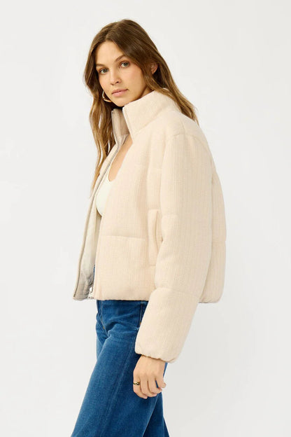 CROPPED PUFFER JACKET IN NATURAL SIDE VIEW