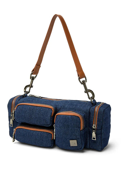Blue cargo handbag with tan trim, dual zip pockets, and side zippers; top handles and strap.