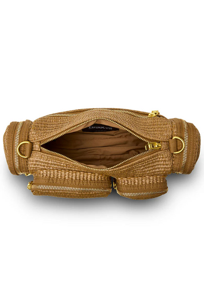 Raffia cargo handbag open top showing fabric lining and interior zip pocket
