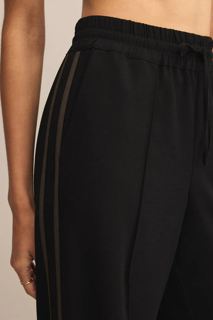 SAUNDER TRACK PANT IN BLACK CLOSEUP VIEW