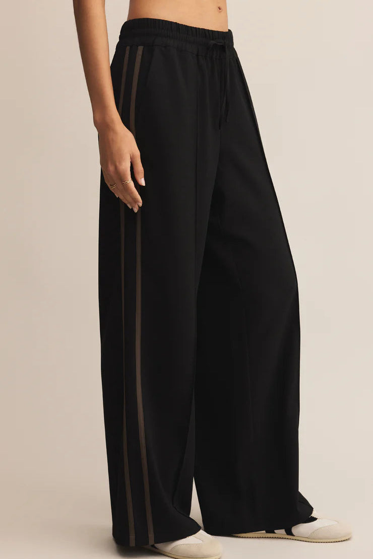 SAUNDER TRACK PANT IN BLACK SIDE VIEW