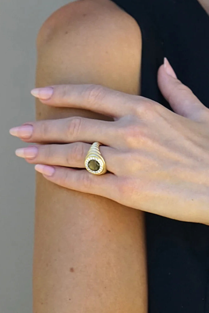 Vintage scalloped coin ring in gold tone, round bezel with halo on finger