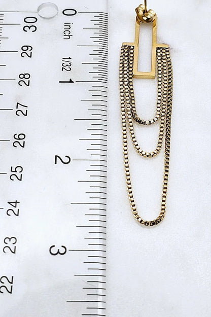Three draped chain earrings in gold showing length as 2 and 3/4.