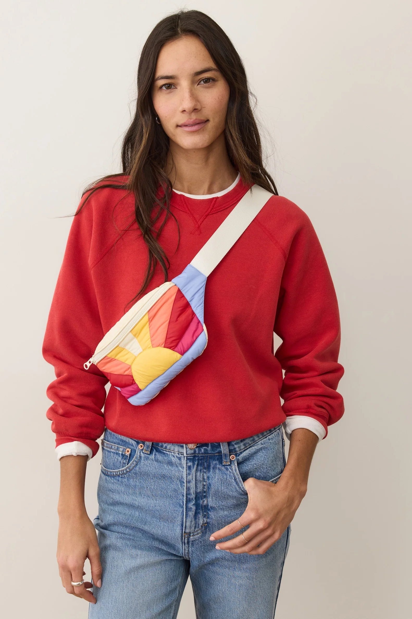 PUFFER FANNY PACK IN MULTI SUN FRONT VIEW ON MODEL