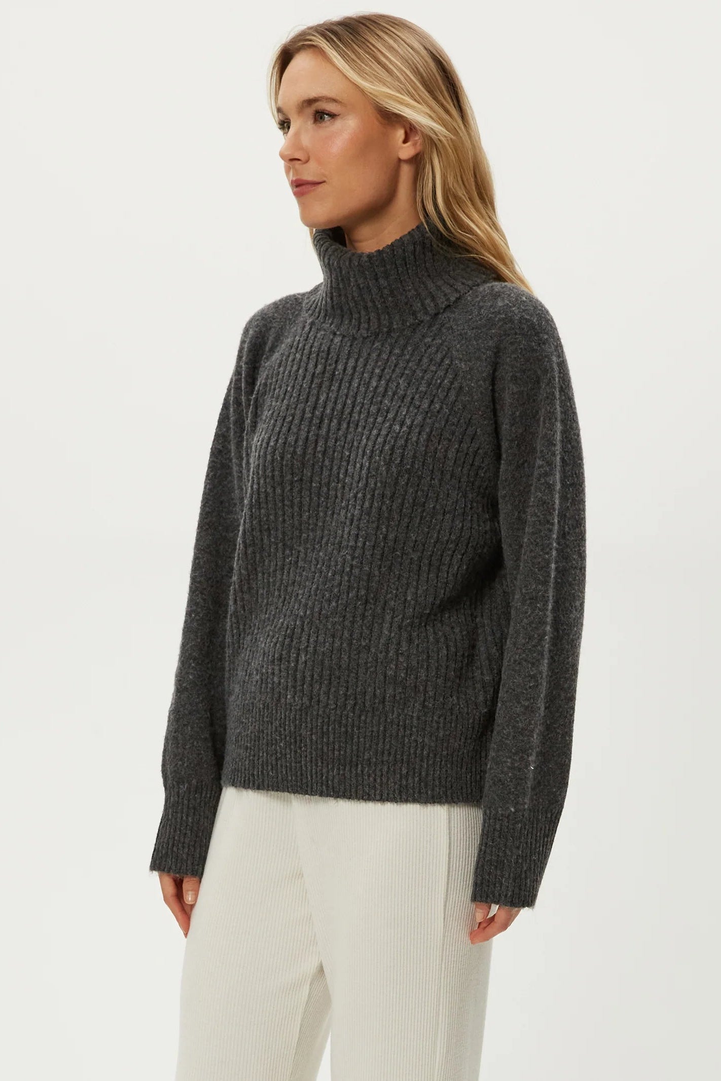 STORM T-NECK PULLOVER IN CHARCOAL SIDE VIEW