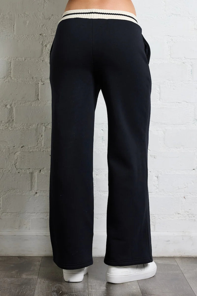 FLEECE WIDE LEG PANTS STRIPED IN BLACK AND IVORY BACK VIEW