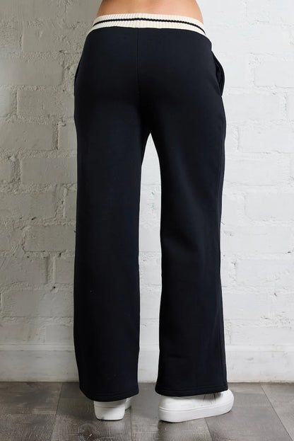 FLEECE WIDE LEG PANTS STRIPED IN BLACK AND IVORY BACK VIEW