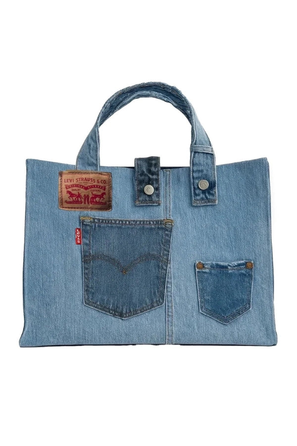 Blue denim tote bag with Levi's branding on a white background