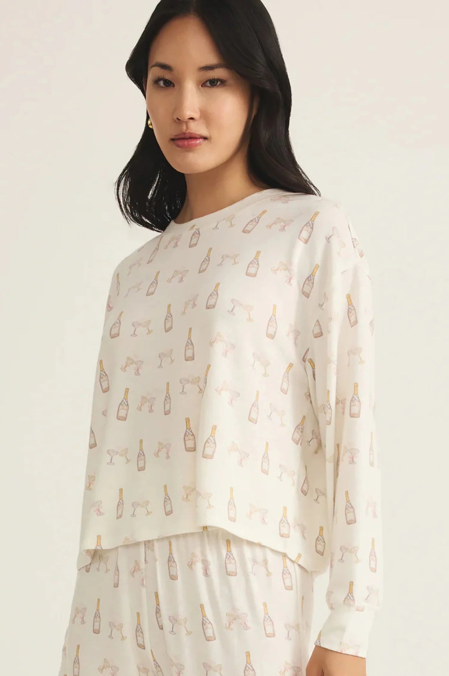 CHAMPS LONG SLEEVE TOP IN VANILLA ICE SIDE VIEW