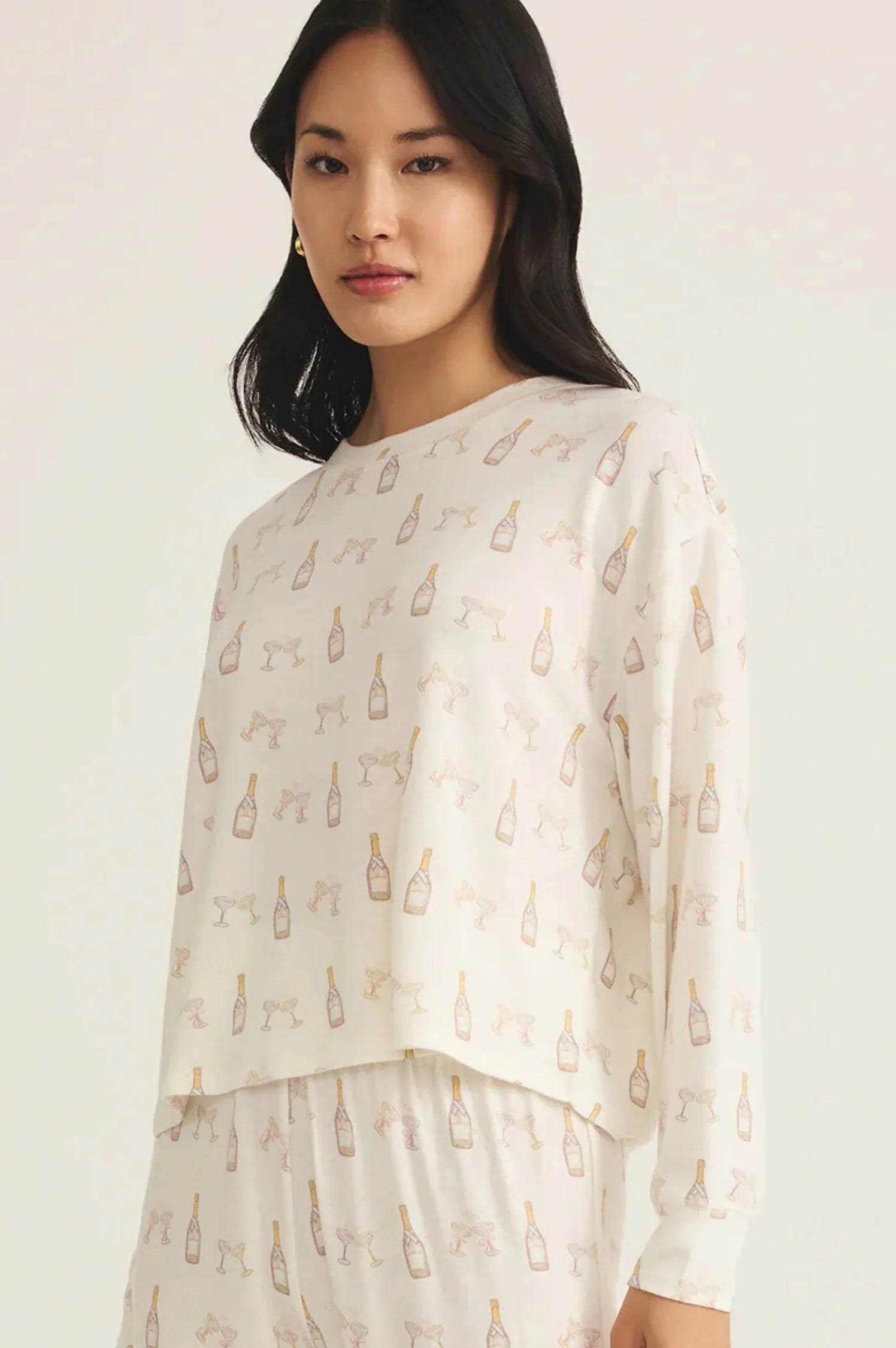 CHAMPS LONG SLEEVE TOP IN VANILLA ICE SIDE VIEW