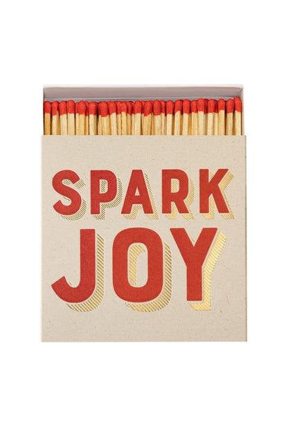 Spark Joy matchbox with red heads and light wood sticks