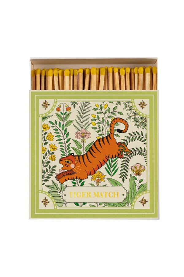 Tiger matchbox with orange tiger illustration, yellow match heads and wood sticks