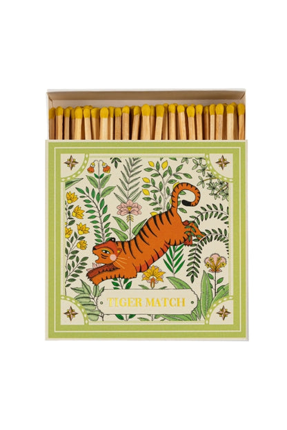 Tiger matchbox with orange tiger illustration, yellow match heads and wood sticks