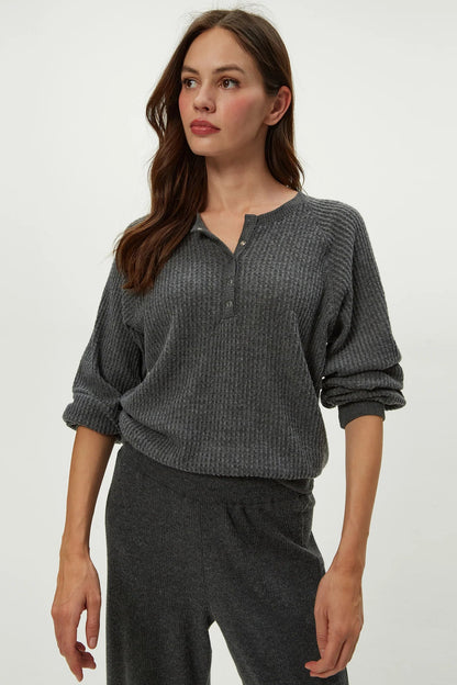 EIRA HENLEY RAGLAN LONG SLEEVE IN CHARCOAL FRONT VIEW