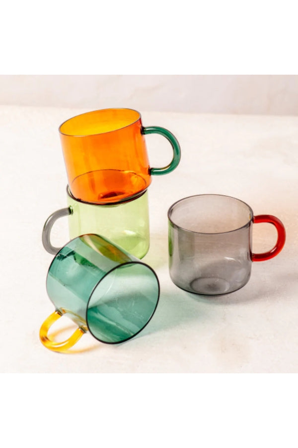 Set of NIKO glass mugs in amber, green, teal, and gray with colorful handles