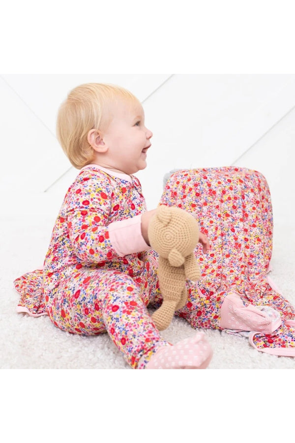 CONVERTIBLE COVERALL IN FLORAL PINK SIDE VIEW