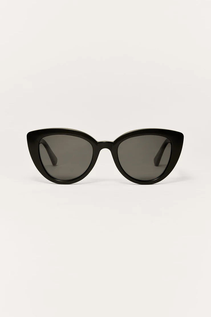 Black cat-eye sunglasses with dark grey gradient lenses