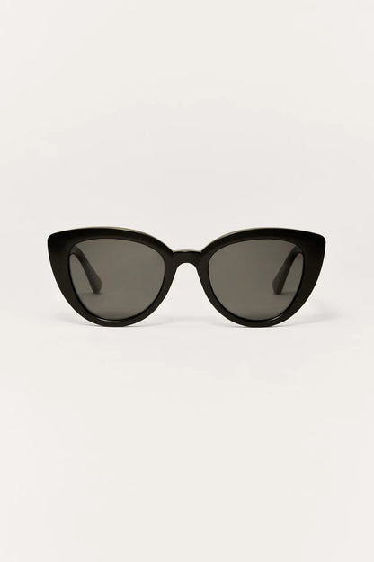 Black cat-eye sunglasses with dark grey gradient lenses