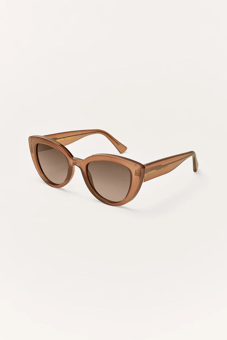 Taupe cat-eye sunglasses with gradient lenses, shown from the side