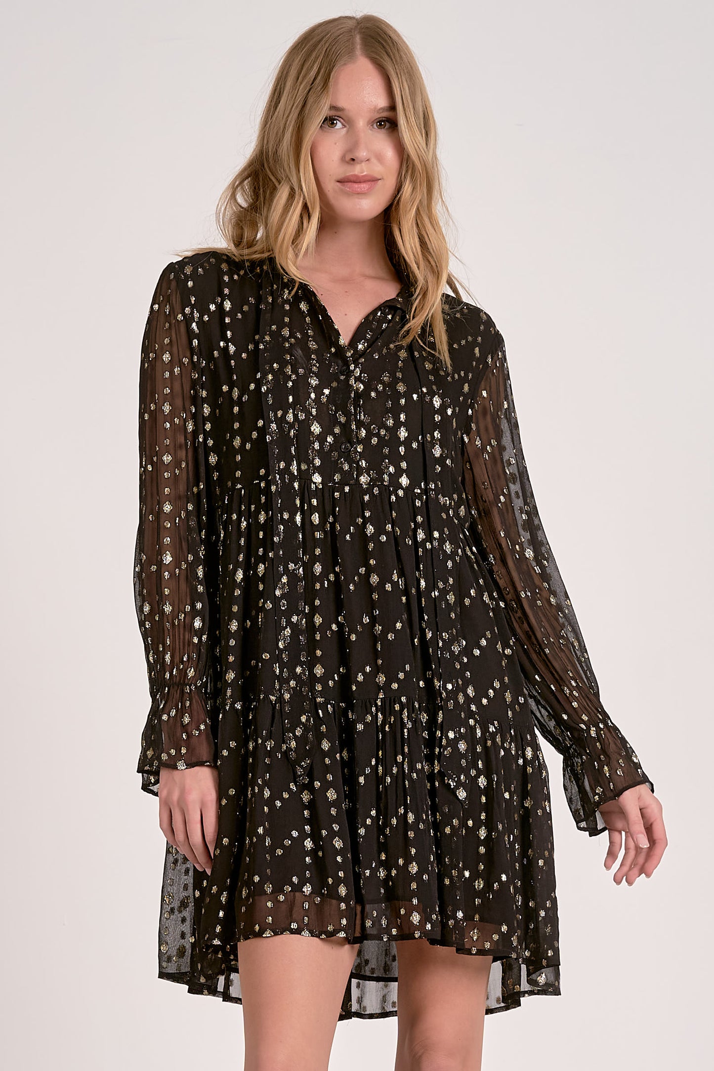 V-NECK BOTTOM RUFFLE DRESS IN BLACK GEO PRINT FRONT VIEW