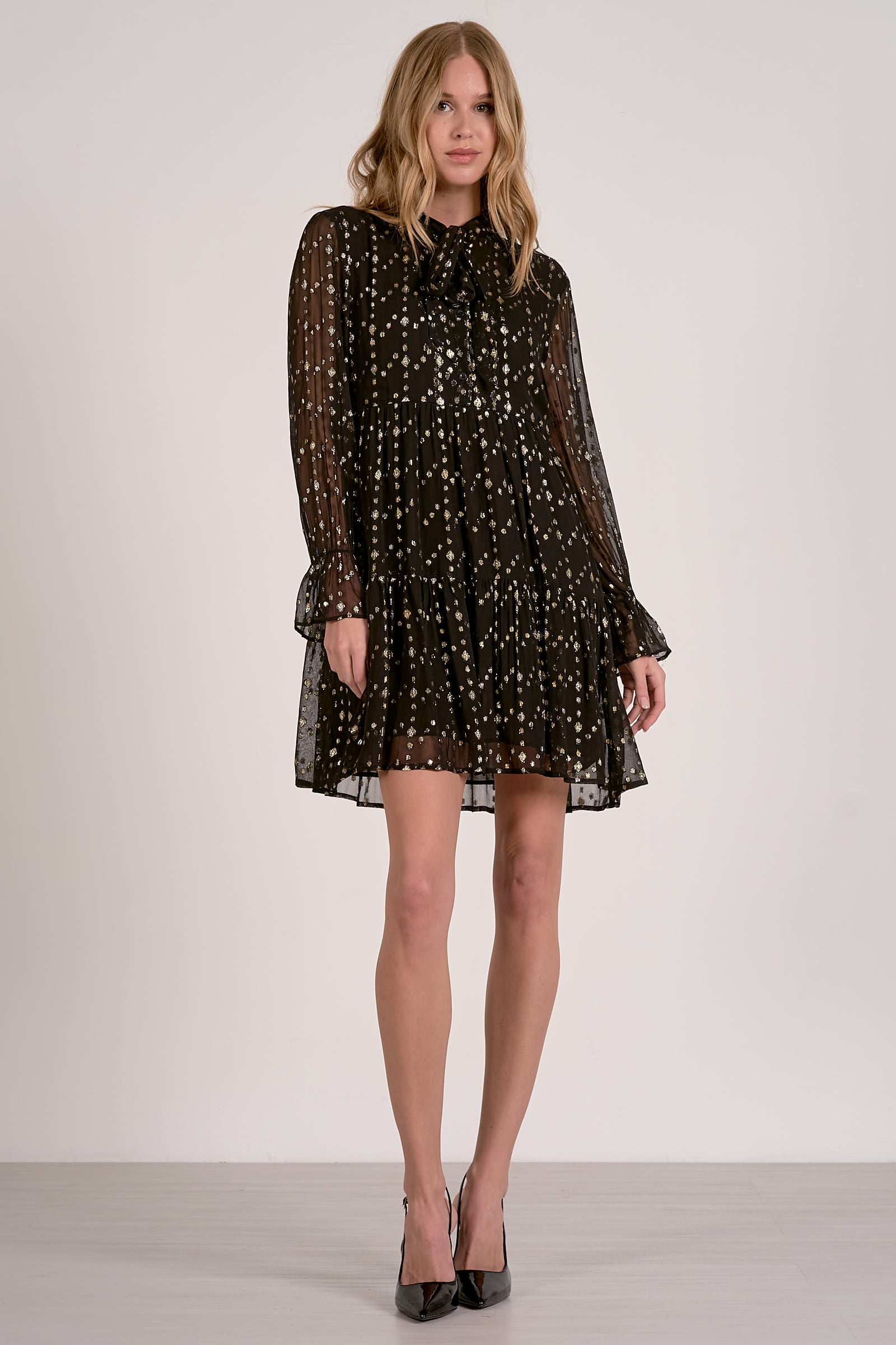 V-NECK BOTTOM RUFFLE DRESS IN BLACK GEO PRINT FRONT VIEW